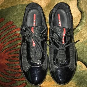 Black patent leather Prada’s